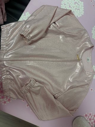 Chaqueta de niña rosa brillante