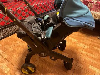 Silla de coche para bebé cochecito seminueva