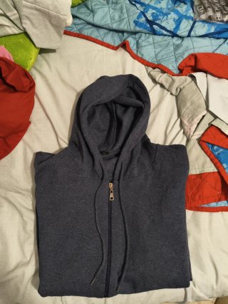 Chaqueta azul con cremallera