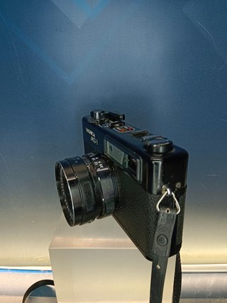 camara de fotos analogica, YASHICA MG-1, objetivo YASHINON, con funda