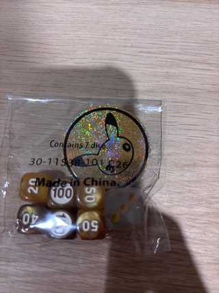 Set Monedas y Dados Pokémon TCG 30 aniversario