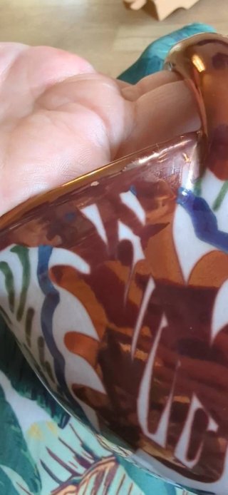 Cestino o barchetta in ceramica con riflesso metallico
