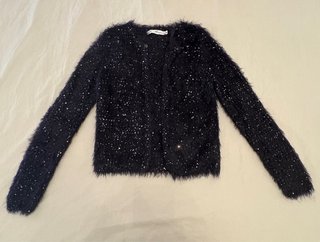 Chaqueta pelo sintético lentejuelas negra