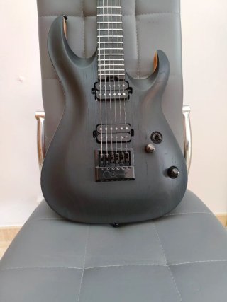Guitarra Eléctrica Cort Negra kx700 evertune