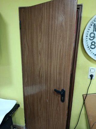 Puerta galvanizada con Acabado en Madera