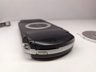 PSP 1004 Negra + Juego F1 + Regalo 2.g.b