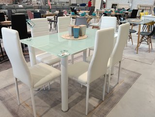 Mesa de comedor con 6 sillas blancas