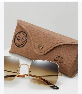 Gafas de sol Ray-Ban doradas y marrones. De mujer.