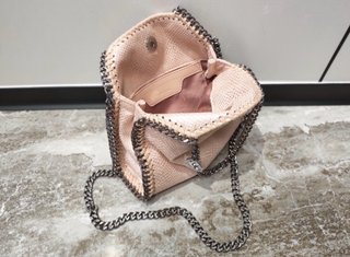 Bolso estilo bohemio rosa y plateado