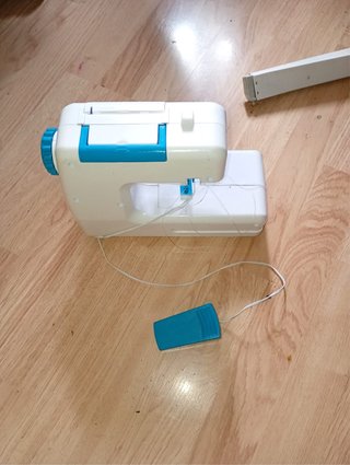 Máquina de coser de juguete
