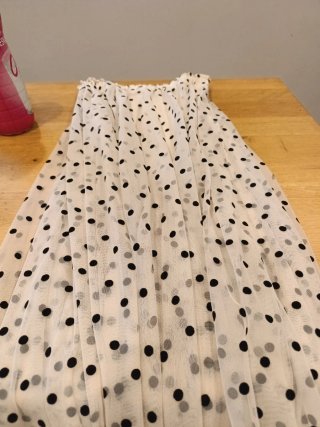 Falda plisada de lunares
