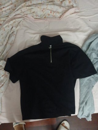 Polo Negro con Cremallera Zara