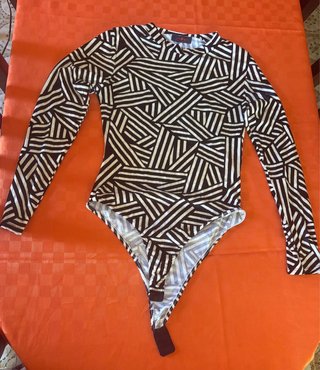 Body a maniche lunghe con motivo geometrico