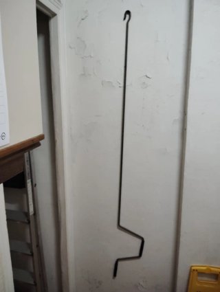 Gancho para chimenea