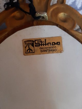 Cuadro de bronce con figura de niña