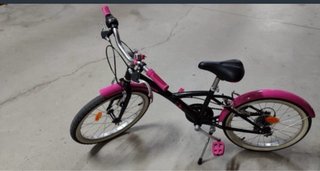 Bicicleta infantil Btwin 20 rosa y negra
