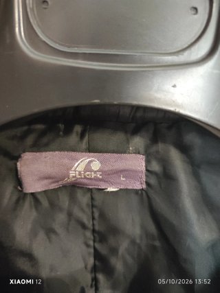 Piumino nero taglia L