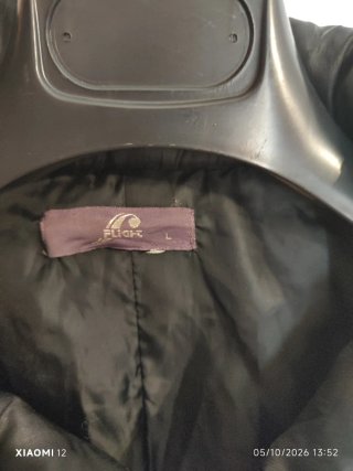 Piumino nero taglia L