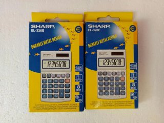 Lote de 11 Calculadoras Sharp,modelos varios.