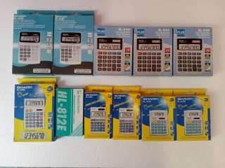 Lote de 11 Calculadoras Sharp,modelos varios.