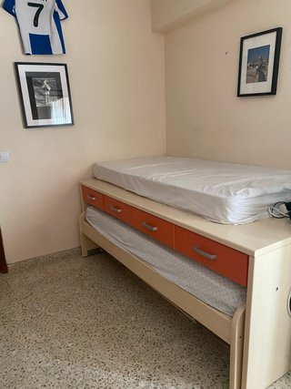 Cama nido beige y naranja