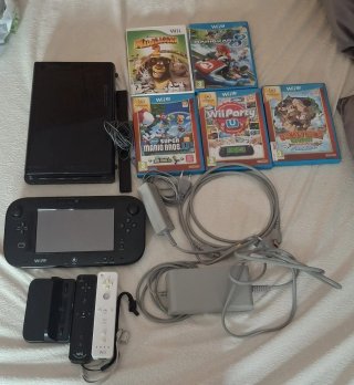 Nintendo Wii U con 2 mandos y juegos
