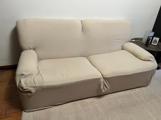 Sofá cama con funda