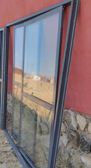 Cancela exterior y ventanas Climalit