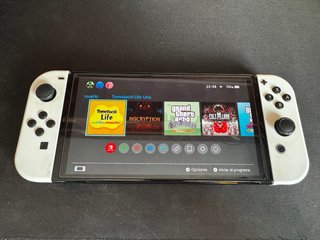 Nintendo Switch OLED Blanca + juegos