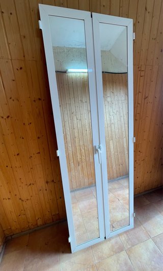Puerta doble de aluminio con cristal