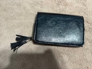 Bolso de fiesta negro con flecos