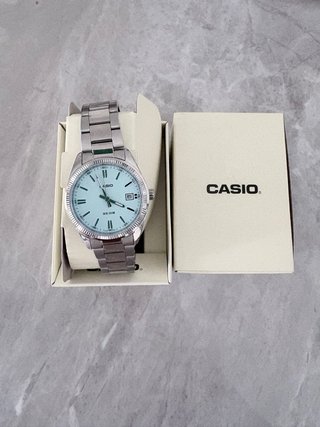 Reloj Casio 1302 tiffany Plateado y Turquesa