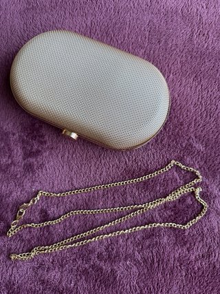 Bolso de mano dorado