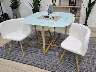 Mesa de cristal templado y 4 sillas