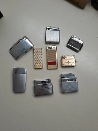 Set di 9 accendini vintage