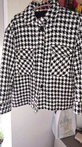 Chaqueta elegante cuadros blanco y negro
