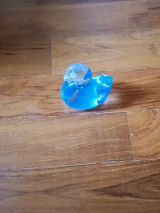 Paperella in vetro blu
