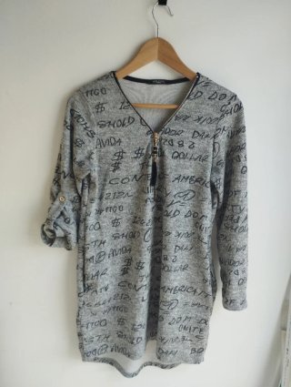 Vestido corto o túnica de punto fino de manga ajus