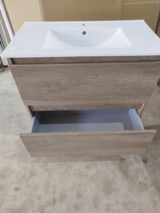 Mueble de baño con lavabo blanco