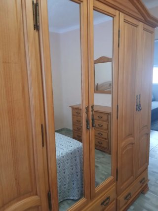 Dormitorio madera maciza