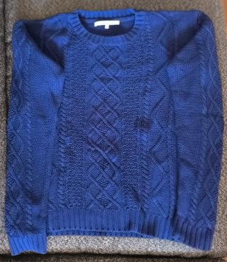 Jersey de punto trenzado azul mujer