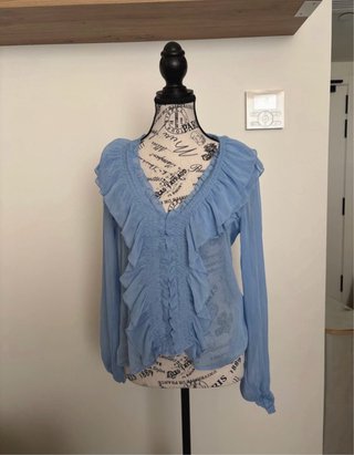 Blusa con volantes