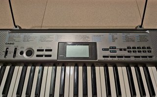 Teclado Casio con Banco de Canciones