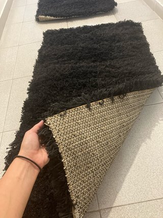 Juego de 2 alfombras negras. 7€ cada por separado