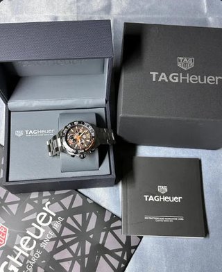 TAG Heuer Cronógrafo Naranja y Plata
