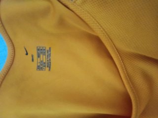Conjunto deportivo Nike naranja y gris