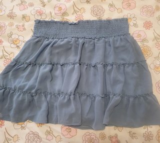Falda de volantes gris