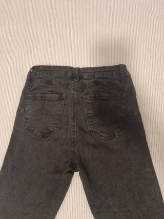 Pantalón tejano chica negro