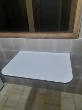 Mesa plegable pared de comedor