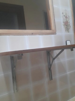 Mesa plegable pared de comedor